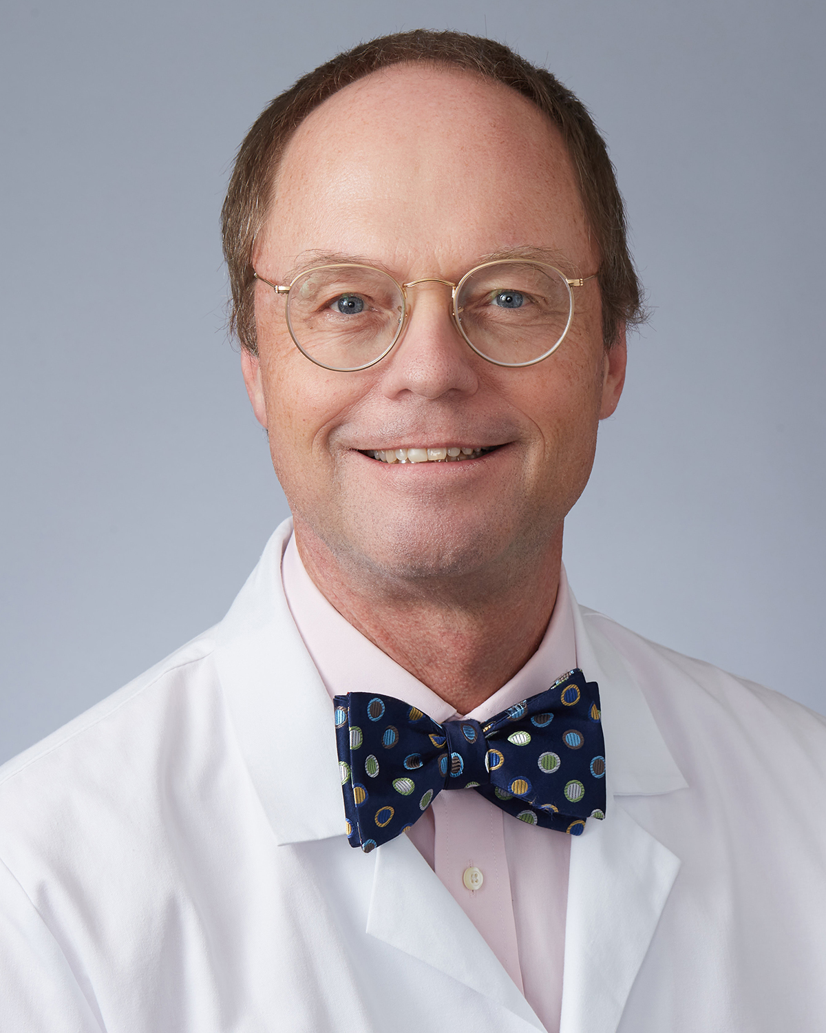 Dr.